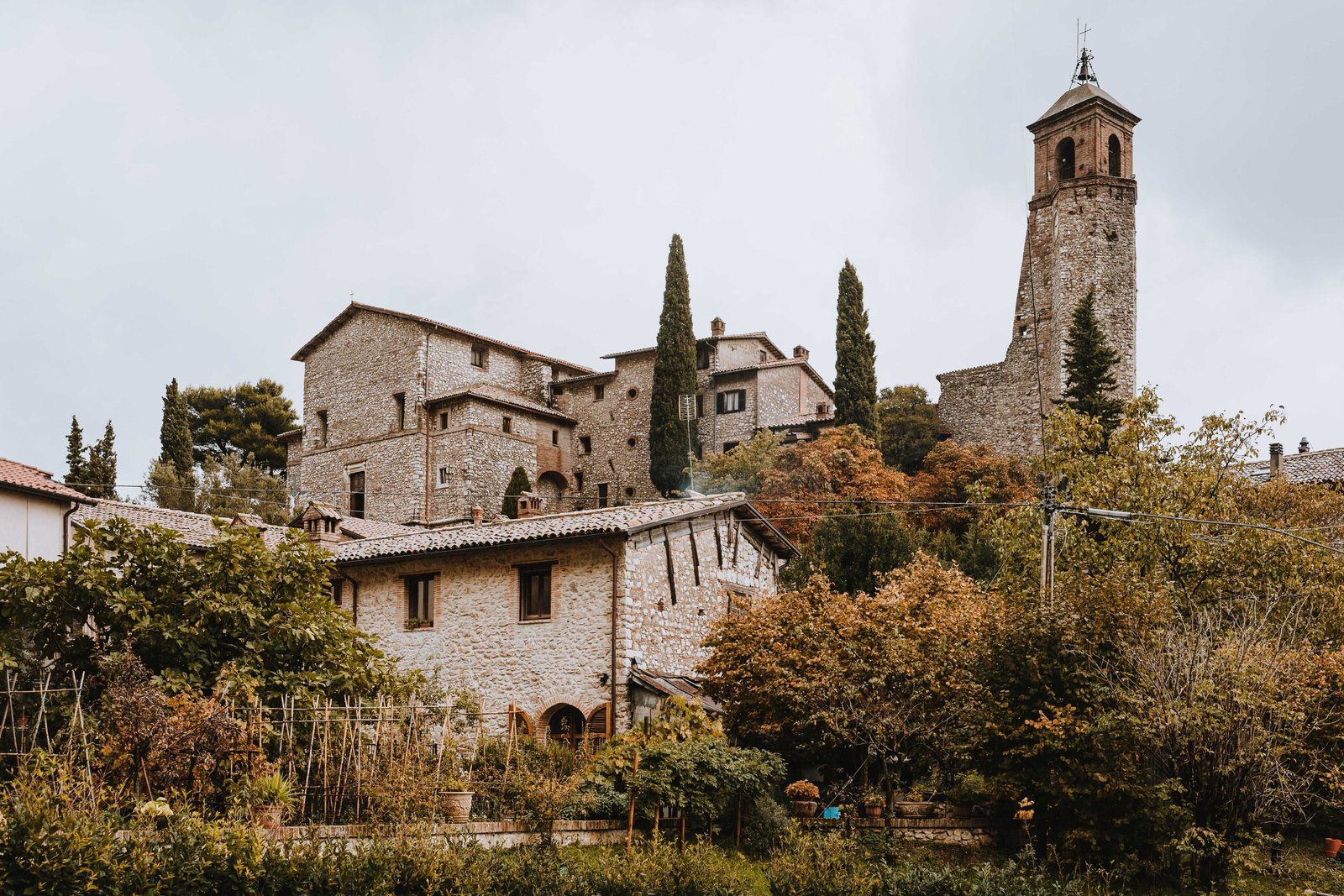 The fourteenth century Catholic church of the Archangel St Michael and bell tower in Greccio, Italy, founded by St Francis of Assisi