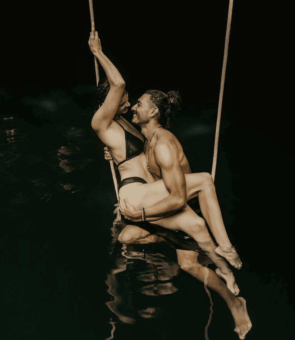 Couple posing at the Calavera Cenote