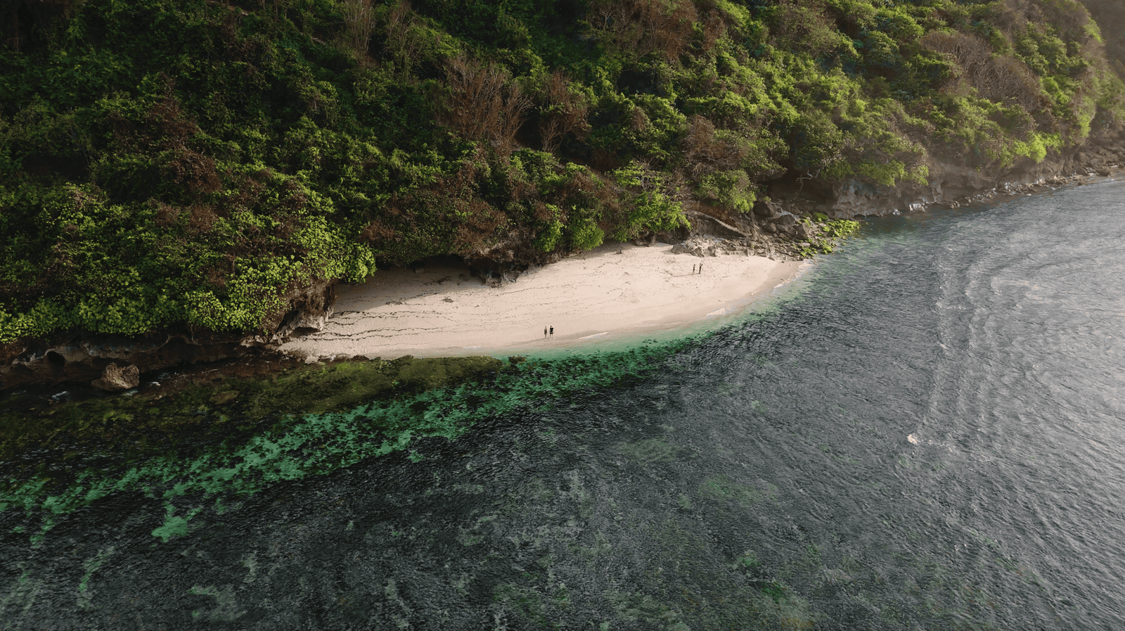 Green bowl beach with Tropical Ocean in Bali Aerial View of Green Bowl Beach with Morning Light