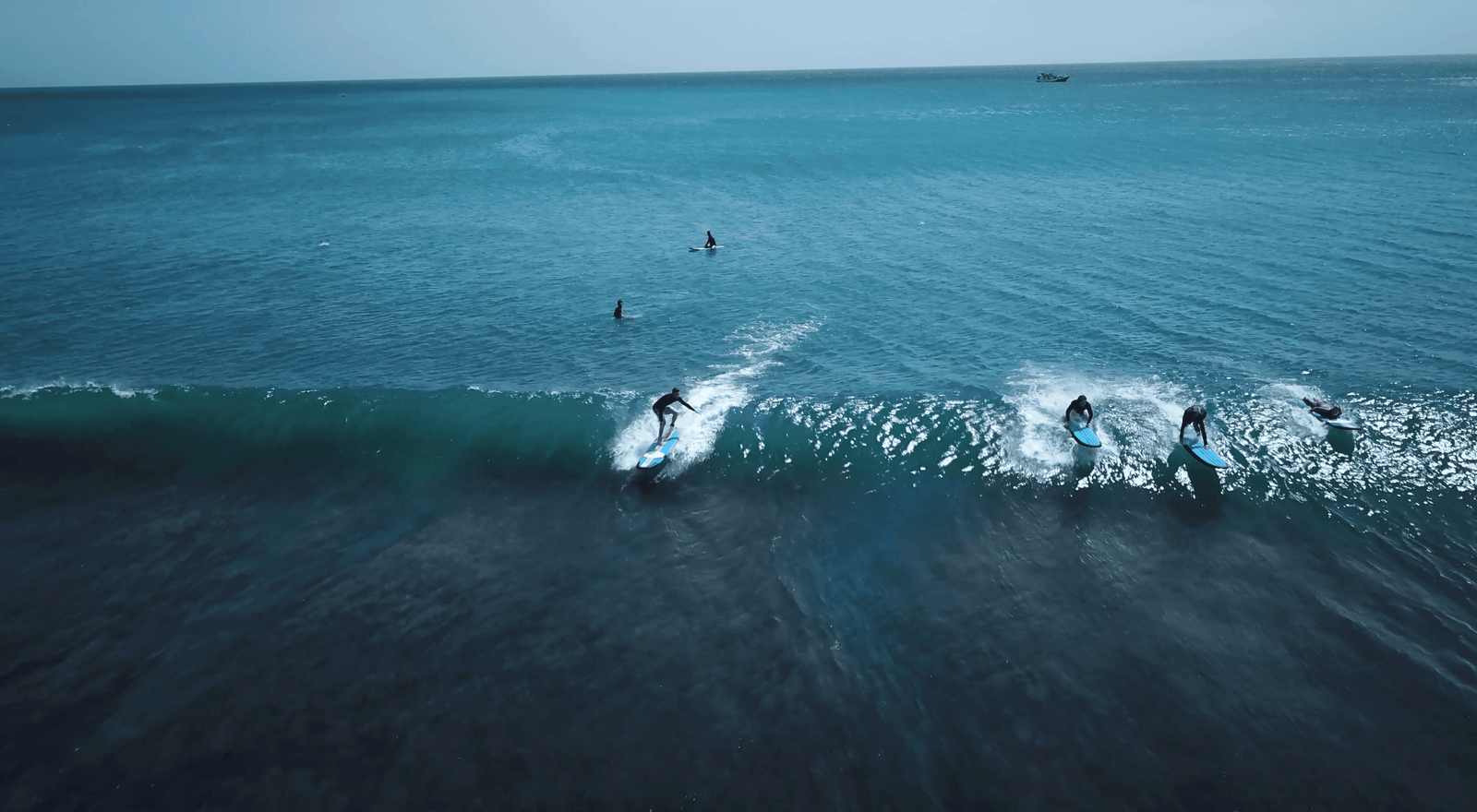 Drone shot of surfers in Padang Padang