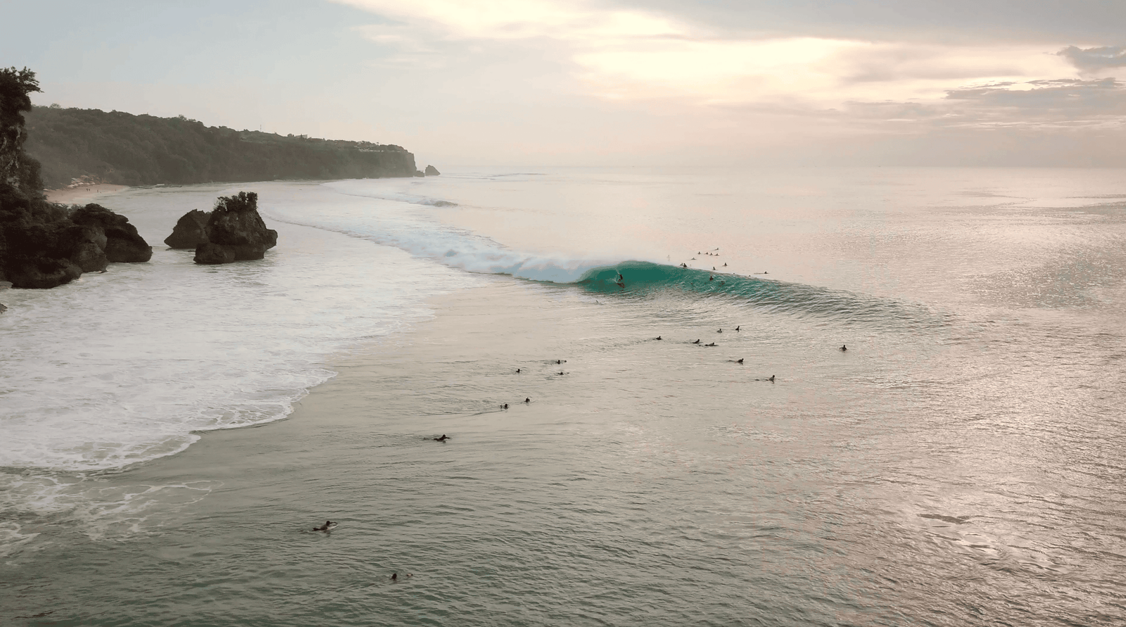Padang Padang surfers catching waves