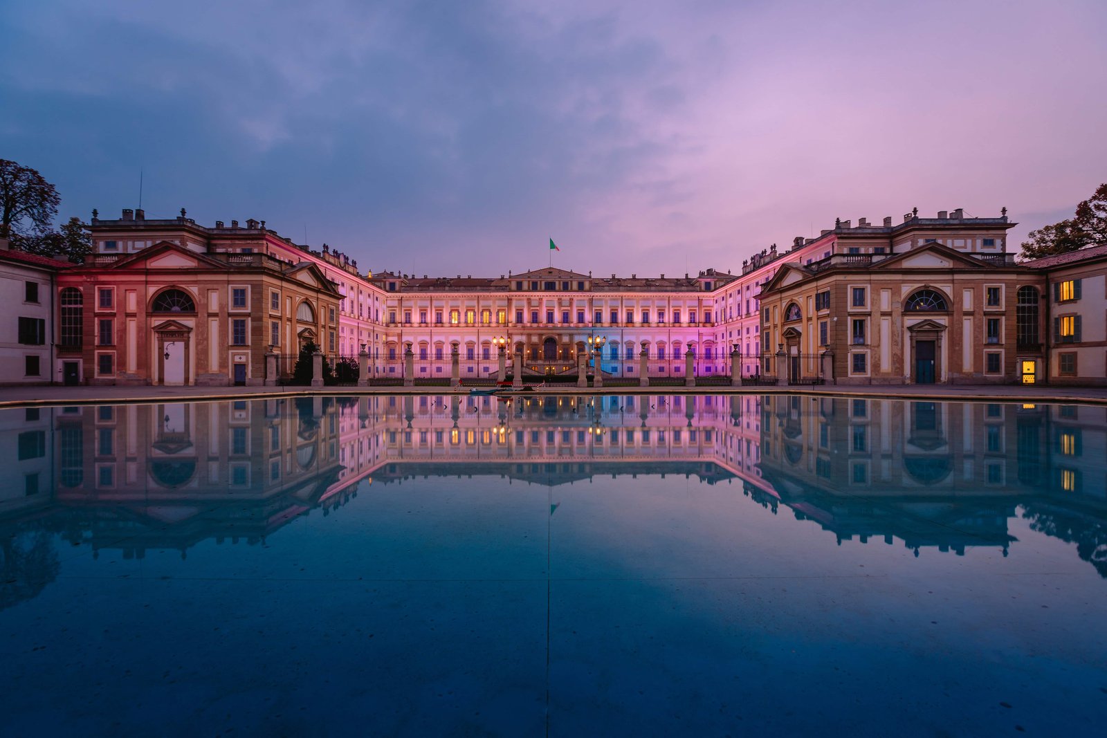 Monza Italy - November 2021: The Royal Villa of Monza, a neoclassical style building illuminated at sunrise