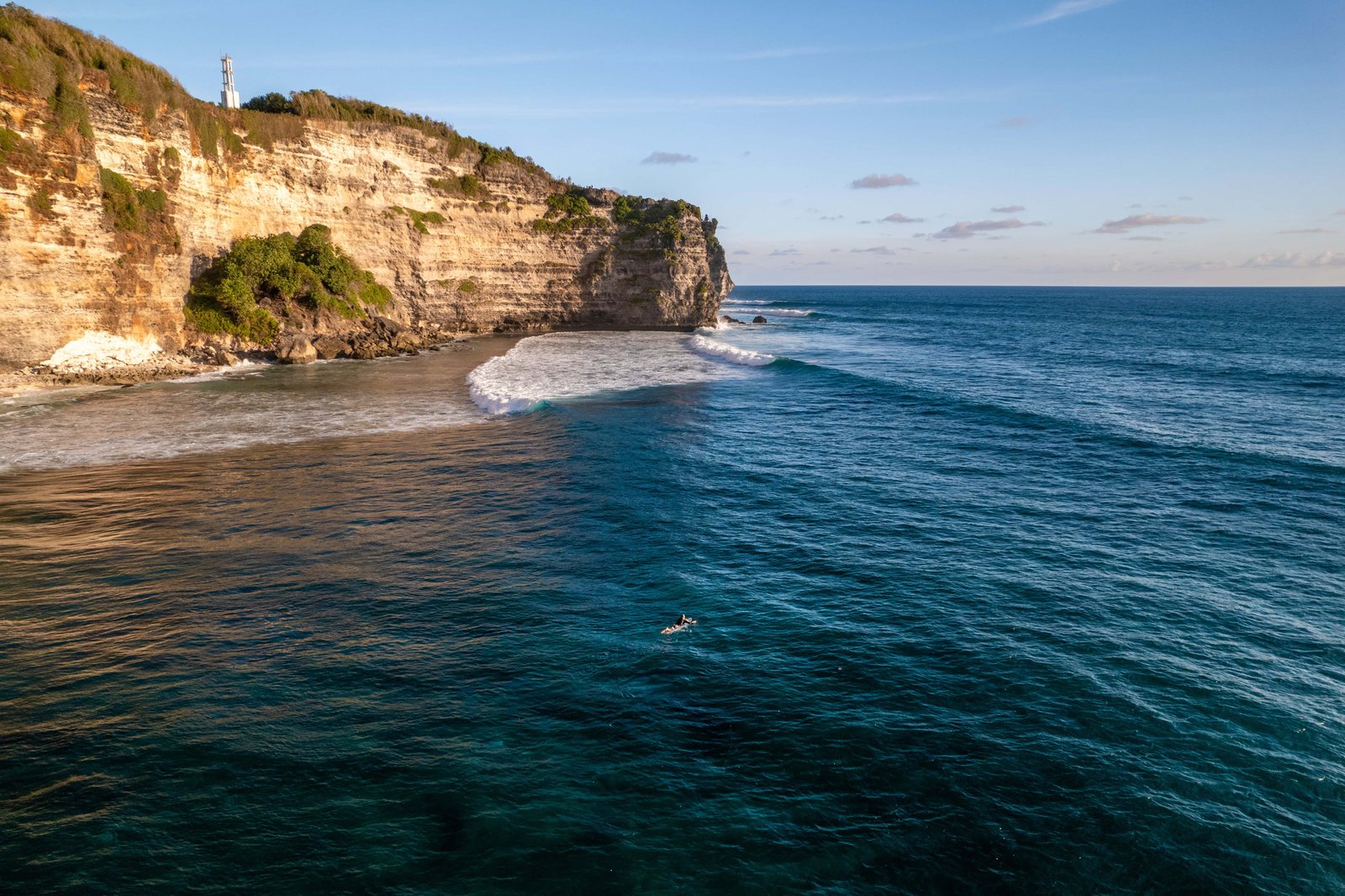 Rocky cliff coastline and ocean, sea, near Uluwatu temple and Batu Jaran in Bali, Indonesia. High quality photo