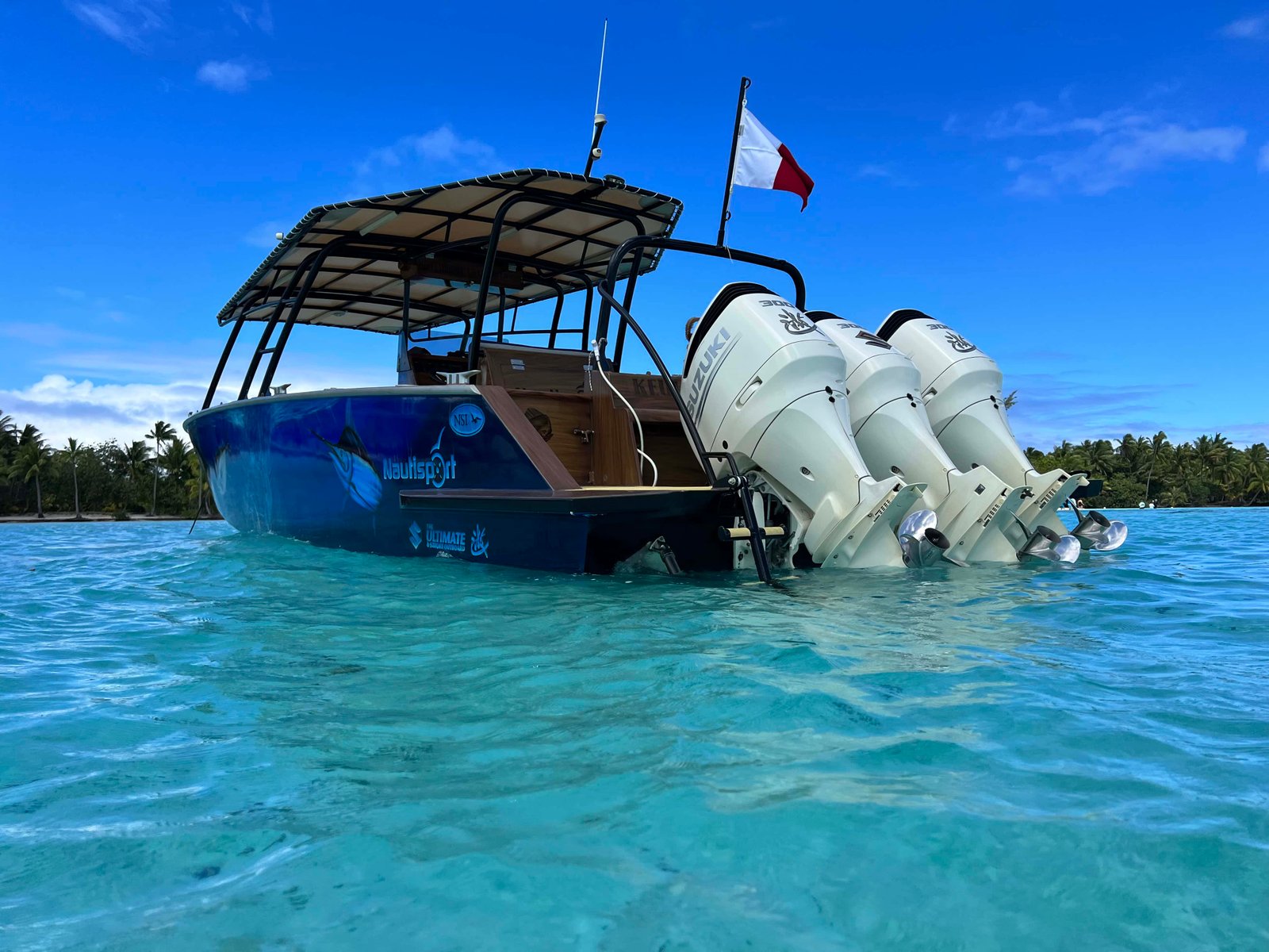 Boat in the waters of Tahaa