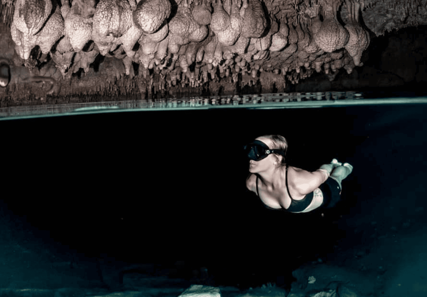 Snorkeling in one of the underground caves in Makatea. 