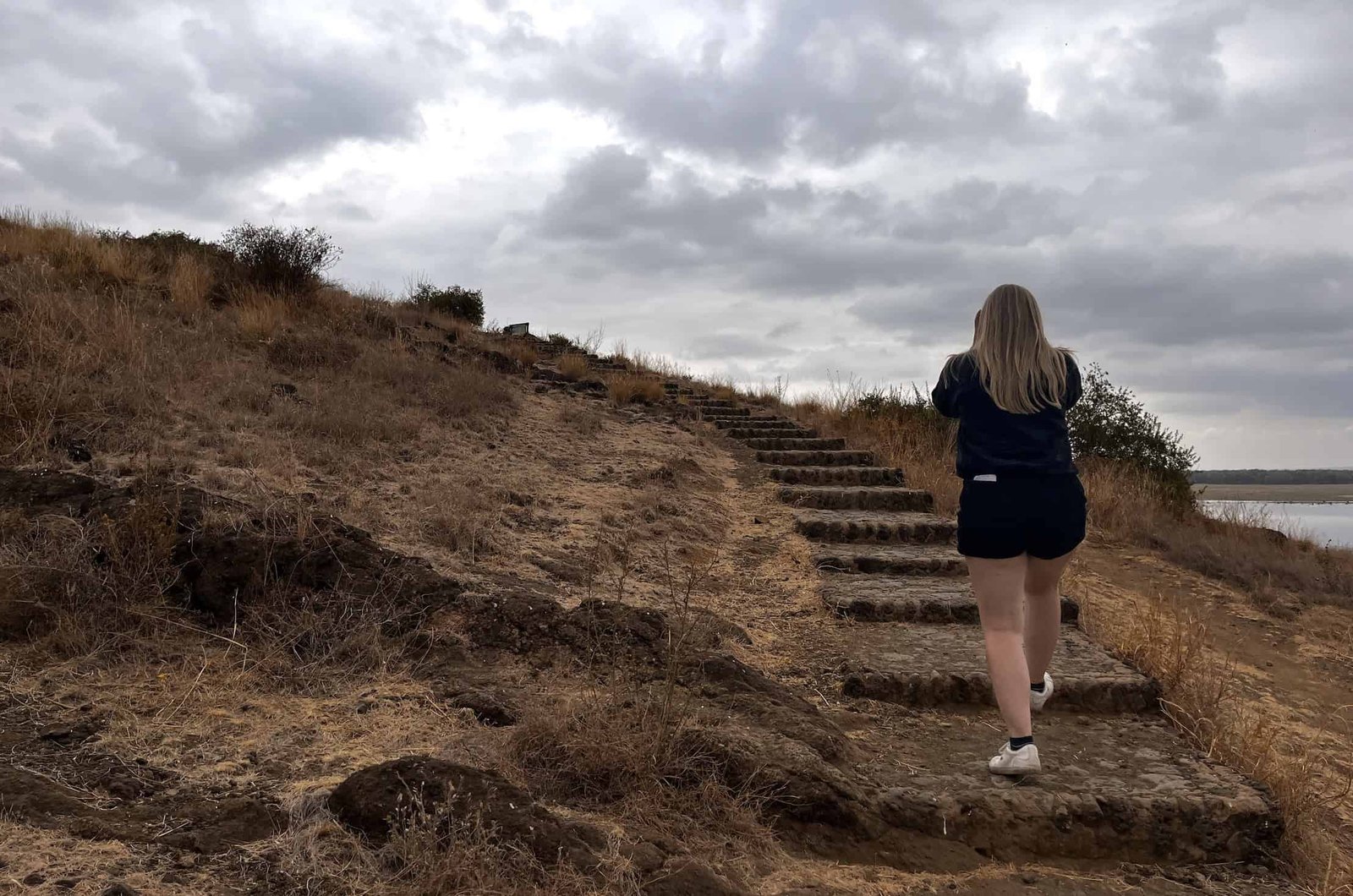 Laura climbing the stairs at Observation Hill