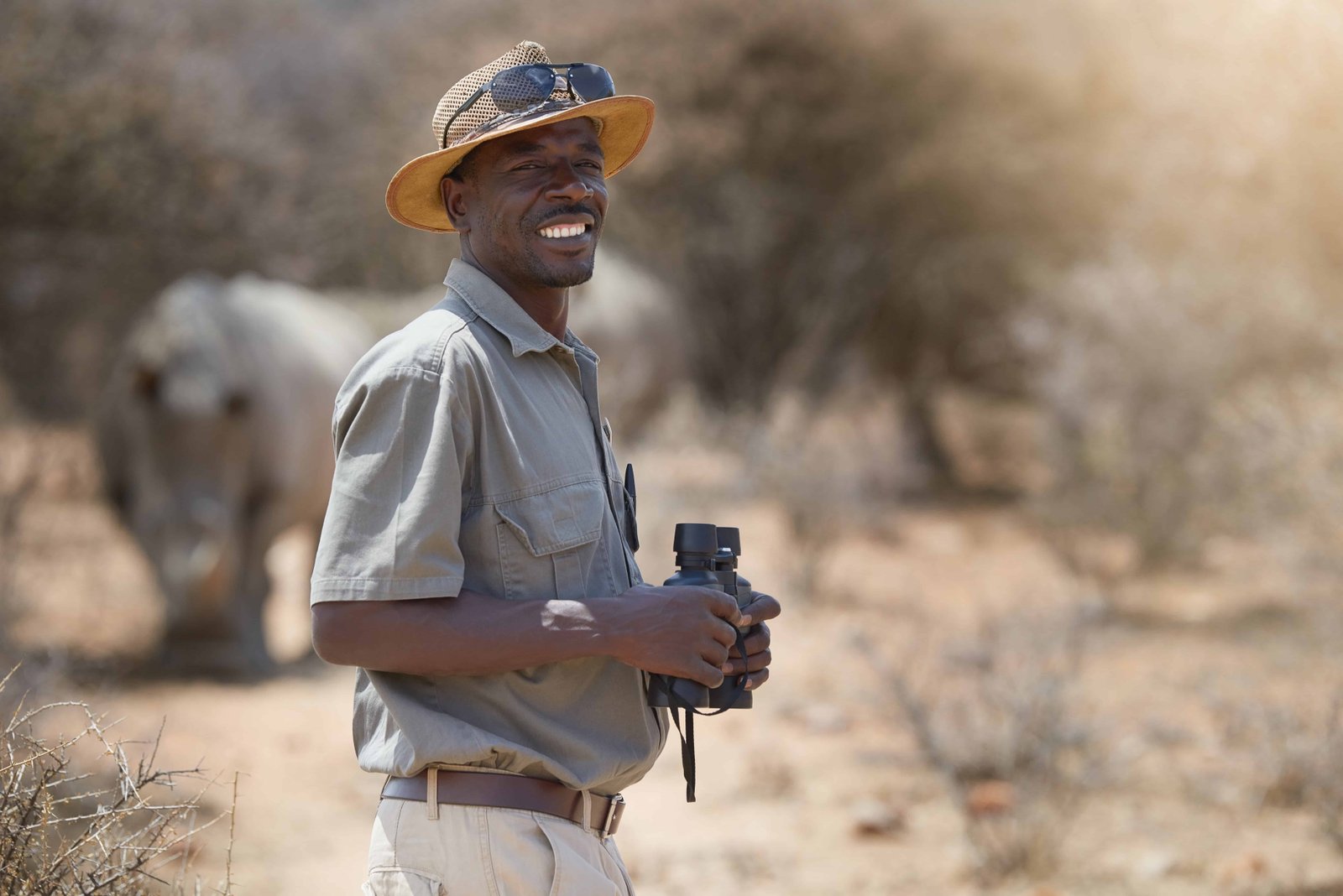 A guide wearing neutral colors on his safari in Kenya 